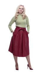 attractive young woman in a red skirt. isolated on a white