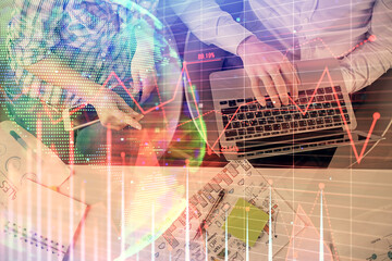 Multi exposure of man and woman working together and forex graph hologram drawing. Financial analysis concept. Computer background. Top View.
