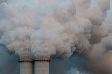 industry chimneys blowing smoke