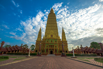 Fototapeta premium The beautiful sculpture background of, Wat Bang Thong, surrounded by trees, has a large area, is a religious tourist attraction in Krabi, with tourists always visiting, Thailand