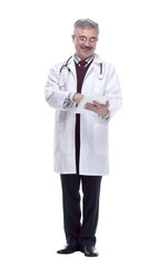 smiling doctor with a digital tablet . isolated on a white