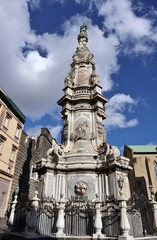 Fototapeta na wymiar Napoli – Guglia dell'Immacolata in Piazza del Gesù Nuovo