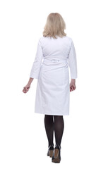 woman doctor walking away. isolated on a white background.