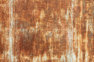 Textured grunge background red peeling paint with rust on old metal surface