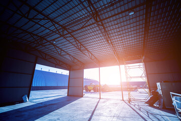 Industrial metallic construction at background with clear sky