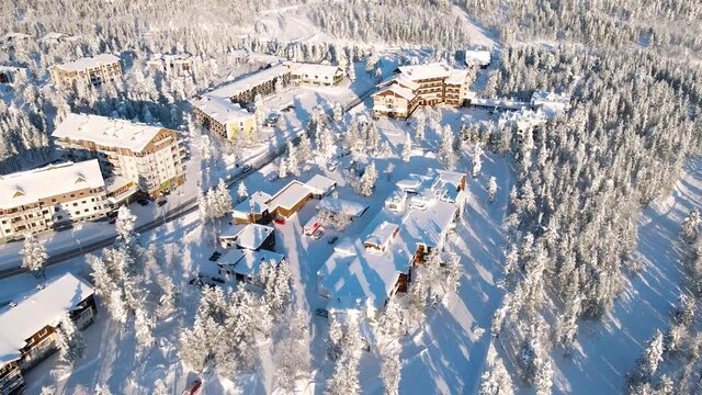 Beautiful vibrant sunny scandinavian winter landscape of skiing resort, lapland