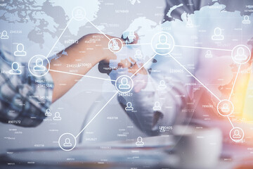 Double exposure of social network theme hologram and handshake of two men.