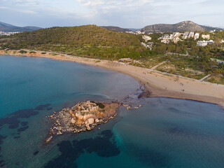 Aerial photo of the small islet at Kavouri, Vouliagmeni during of the phenomenon of low tide. 