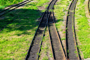 Fototapeta premium Old abandoned railway, intertwining railroad tracks