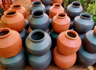 A clay water pot earthen pot for water storage Clay pots not only cool the water down, they also provide healing with the elements of earth.
