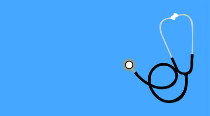 Stethoscope, top view on blue background.World medicine day concept.Copy space.