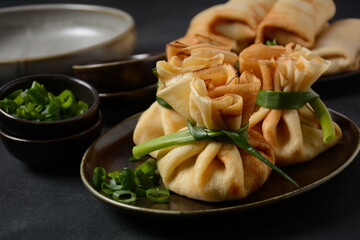 Chicken-Filled Crepe Party Purses. Pancakes rolled into a bag and stuffed with chicken meat