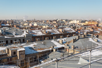 Fototapeta premium Top bottom view on the roofs of the big city.