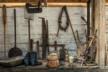 Antique household utensils for working in a rural garden	
