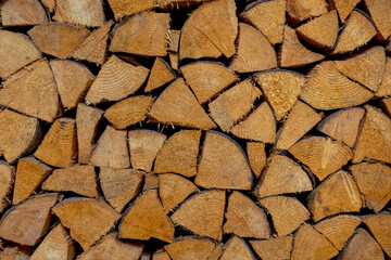Texture of an old weathered firewood logs