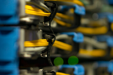 Optical cables are laid in an organizer in the communication operator's cabinet. Telecommunicaccessories, center, cloud server, communication, computer cable, computer equipmenation cable accessories.