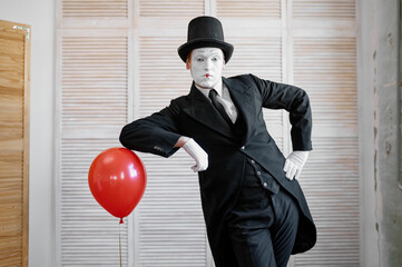 Mime artist, scene with air balloon, comedy parody