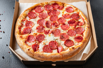pizza salami or pepperoni sausage cheese filling fast food fresh bakery snack meal top view copy space for text food background rustic image