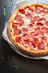 pizza salami or pepperoni sausage cheese filling fast food fresh bakery snack meal top view copy space for text food background rustic image