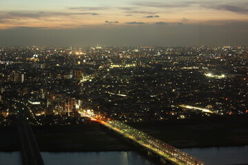 Naklejka premium Tokyo Cityscape at dusk with Sumidagawa river in Tokyo city, Japan - 東京 夕暮れの景色