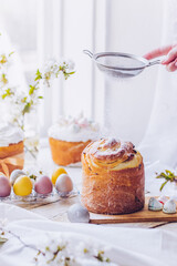 Traditional ukrainian easter cake with white swiss meringue. New cruffin cake trend 2021. Spring...