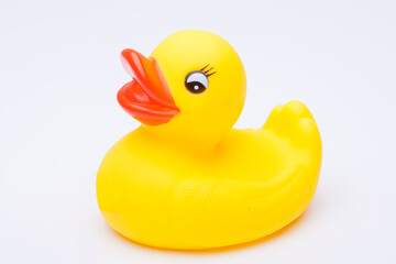 Yellow rubber duck for a kid's bath time, isolated on white background