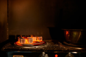Hot hookah coal closeup, nobody, shisha bar