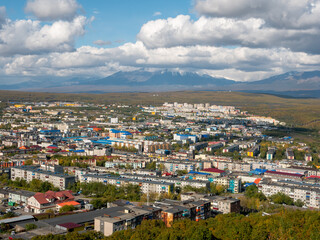 View of the city of Petropavlovsk-Kamchatsky from Mishennaya Sopka. Magnificent views of the city and home volcanoes from above. Kamchatka Peninsula, Russia.