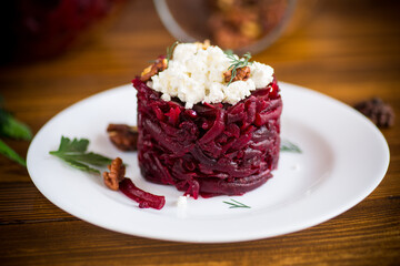 dietary salad of boiled beets with walnuts and cottage cheese