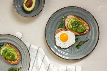 Avocado toast. Sliced bread with avocado.