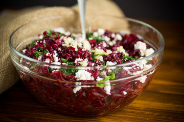 dietary salad of boiled beets with walnuts and cottage cheese