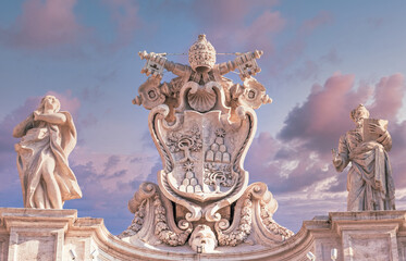 Fototapeta na wymiar Antique Vatican symbol located in Saint Peter Square, Rome, Italy