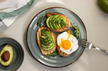 Avocado toast. Sliced bread with avocado.