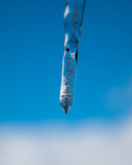 Ice spike on a blue background
