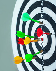  Closeup of dart board with arrows, selective focus.
