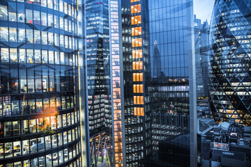 London, UK - April 25, 2021: City of London at dusk, banking and office international financial district panoramic view with skyscrapers.  - obrazy, fototapety, plakaty