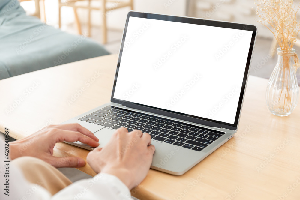 Wall mural computer screen blank mockup.hand woman work using laptop with white background for advertising,cont