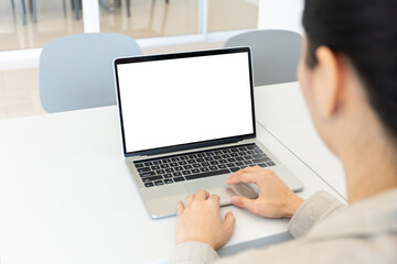 computer screen blank mockup.hand woman work using laptop with white background for advertising,contact business search information on desk at coffee shop.marketing and creative design