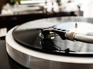 Turntable plays a vinyl record

