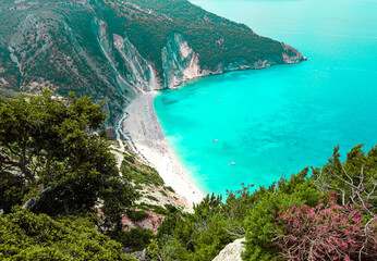 Myrtos beach on the Ionian island of Kefalonia, Greece, with calm, turquoise sea