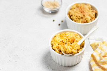 Pasta casserole mac and cheese  in backing dish.Space for text.