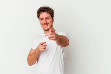 Young caucasian man isolated on white background cheerful smiles pointing to front.