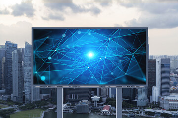 Glowing hologram of technological process on billboard, aerial panoramic cityscape of Singapore at sunset. The largest innovative hub of tech services in Southeast Asia.