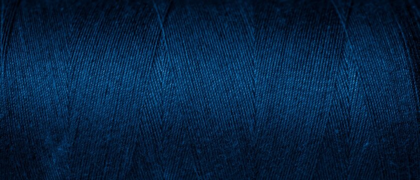 blue cotton threads with visible details. background