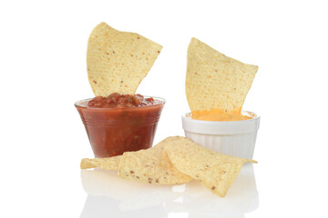 closeup nacho corn chips dipped in cheese and salsa