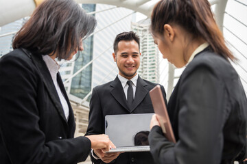 Business discussion by multi race co-workers