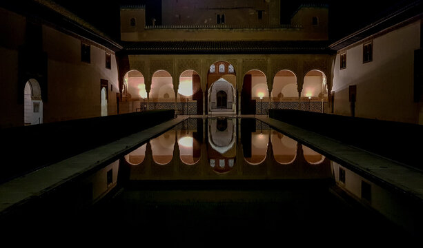 Alhambra at night inside the Patio de los Arrayanes
in granada, Spain
