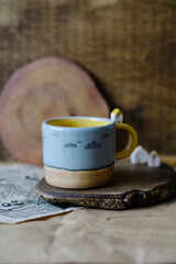 Fototapeta na wymiar Handmade ceramic craft ware. Cup.