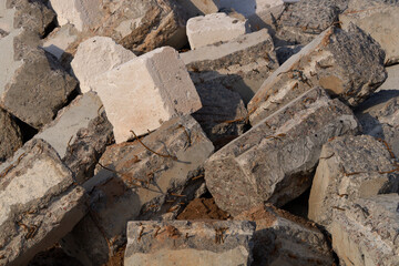 A pile of concrete rubble with rebar.