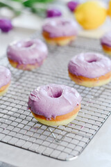 Colorful dessert purple donuts Spring Easter